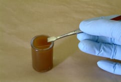 picture of a slide being placed on a sample